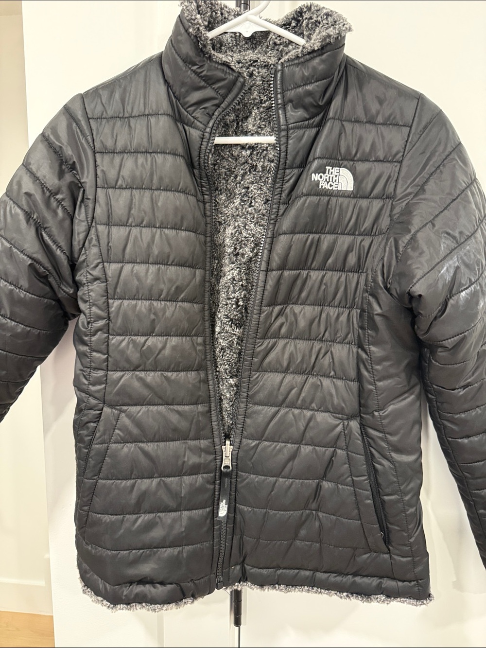 The North Face Women’s Black Quilted Puffer Jacket with Sherpa Lining